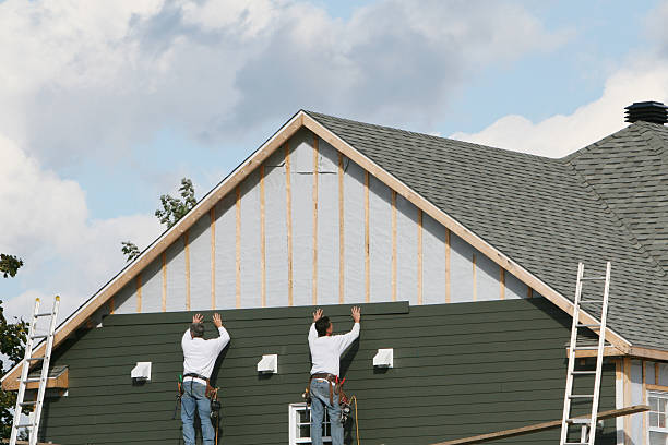 Professional Siding Installation technician working in Tilghman, MD